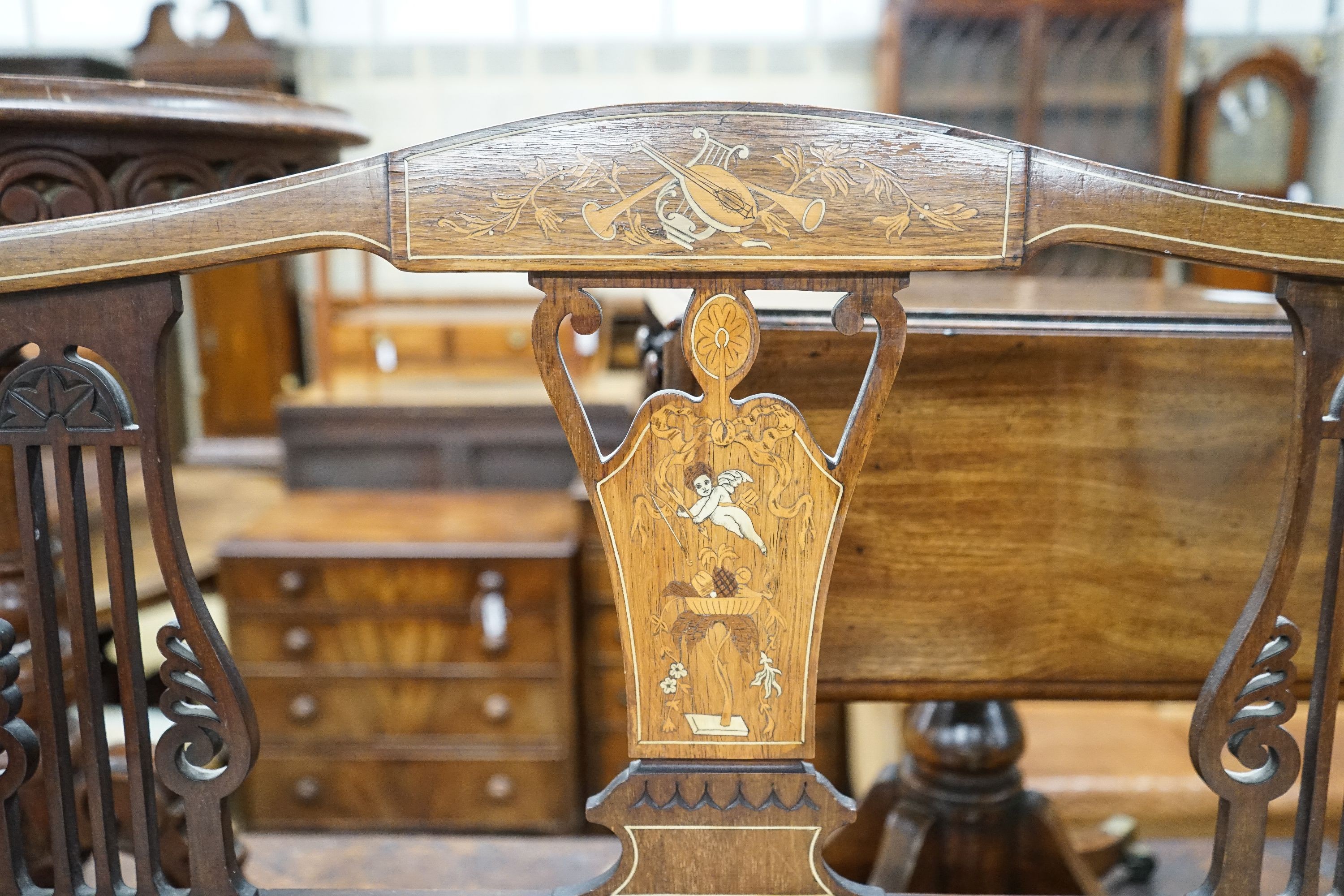 An Edwardian marquetry inlaid mahogany window seat, length 107cm, depth 44cm, height 79cm